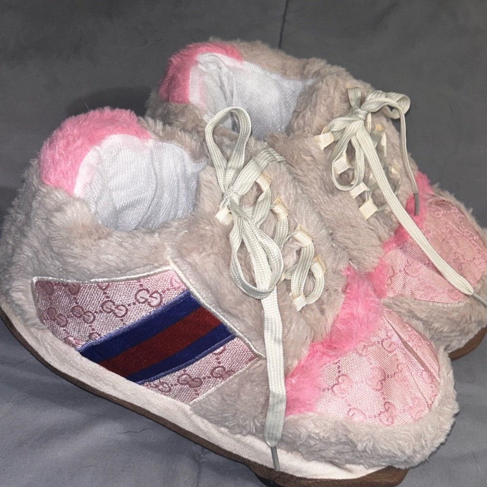 Warm fuzzy pink and creme slippers. Lace up No slip soles. Brand new. Unbranded.
